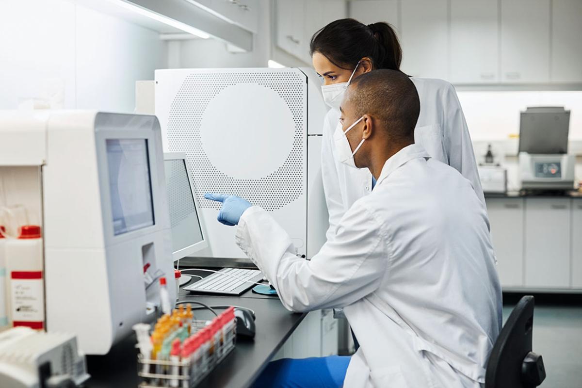 Two health care professionals working in a laboratory