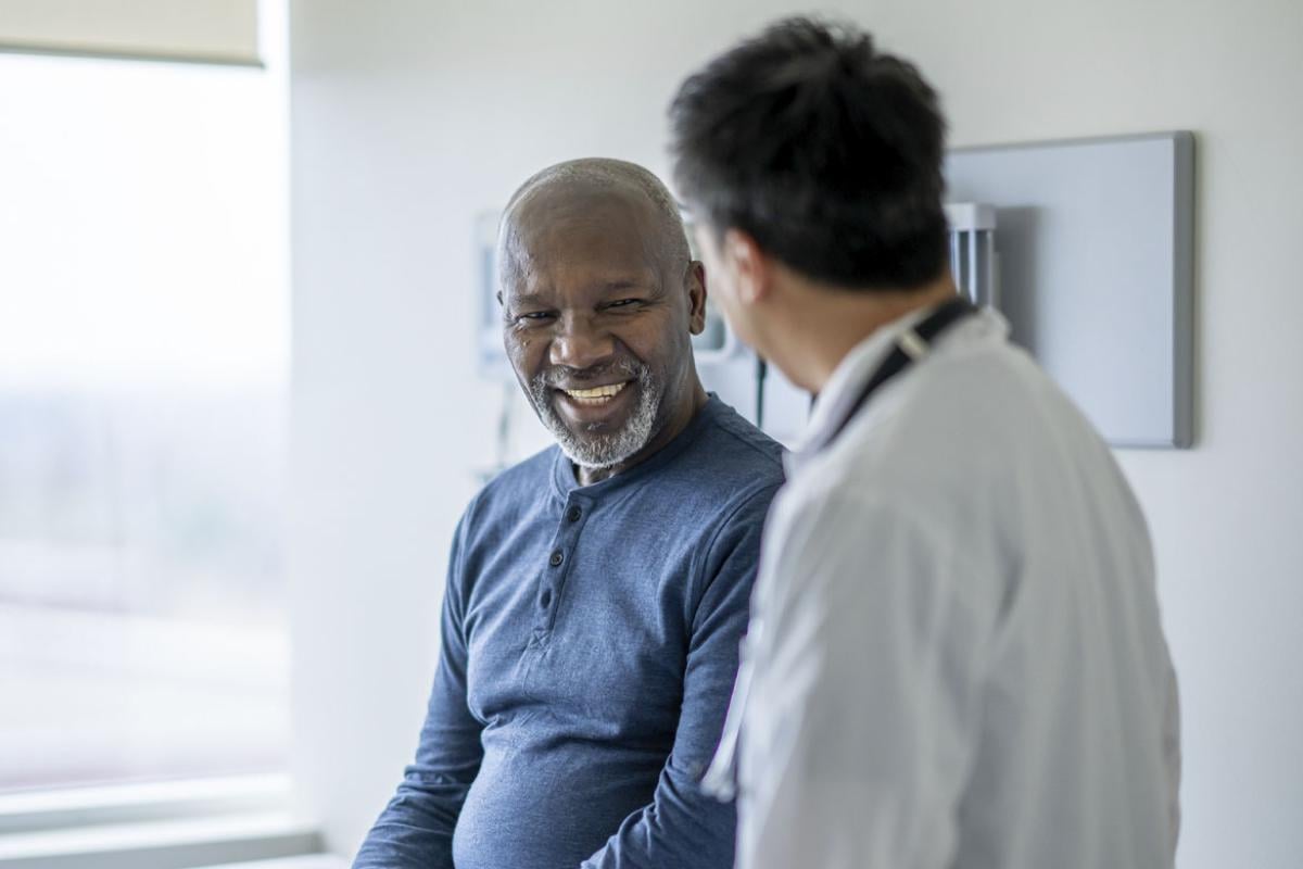 Patient smiling at doctor