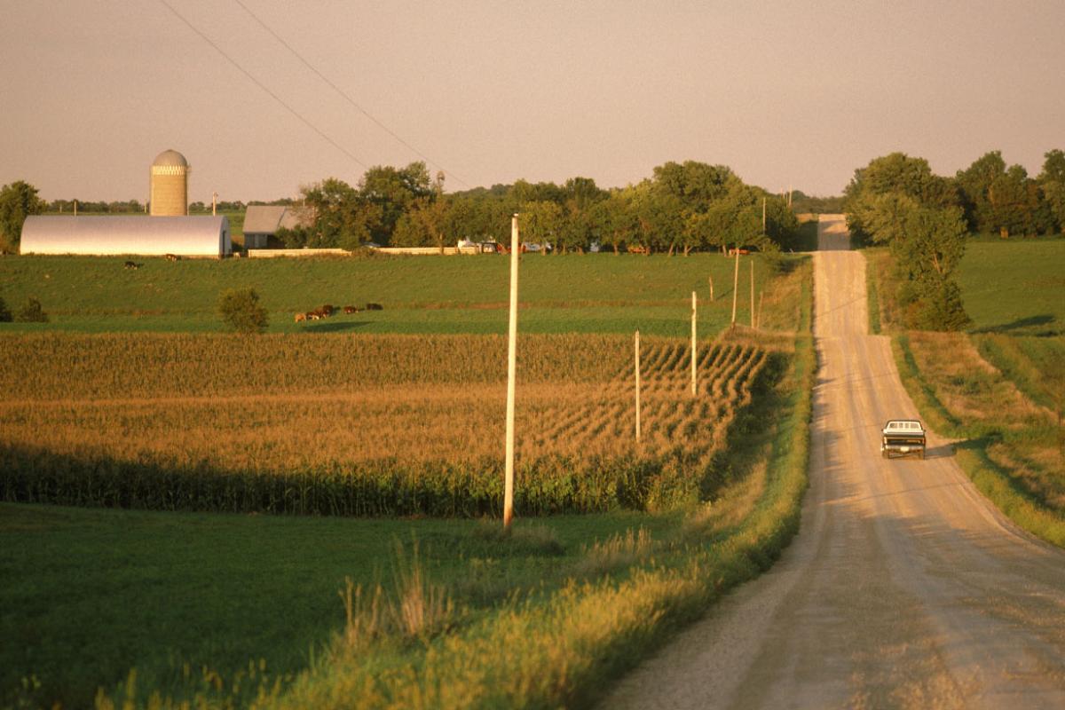 Truck drives down a rural road