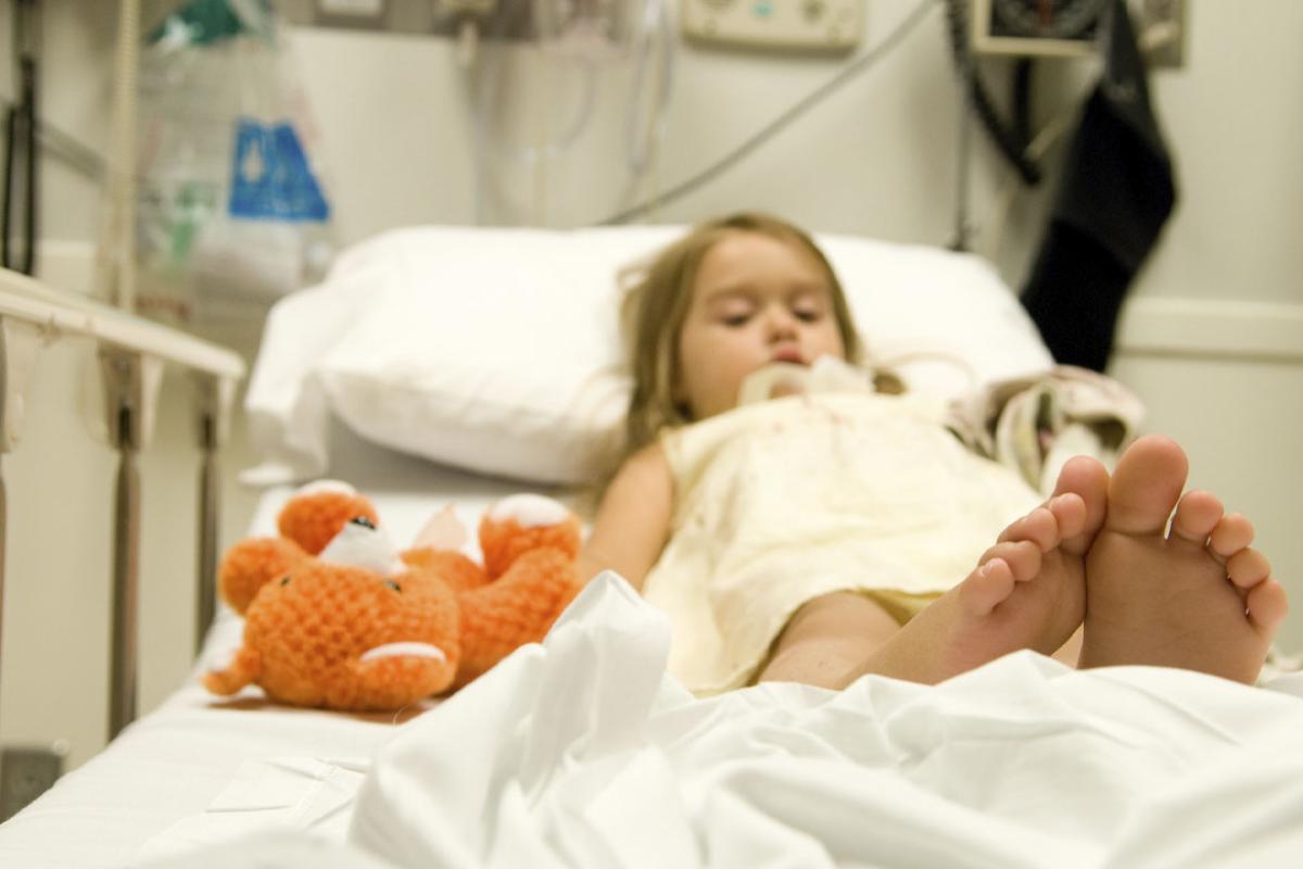 Young child in a hospital bed