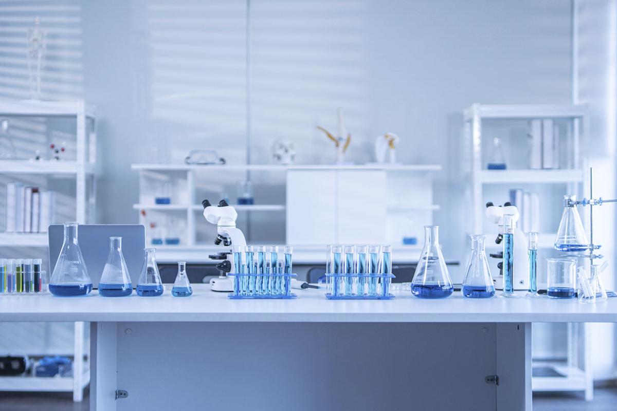 Empty science laboratory with microscopes, test tubes and other equipment