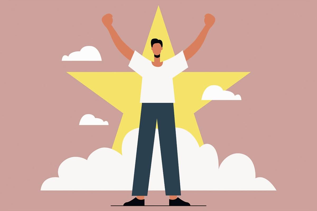 Figure holds up arms in victory