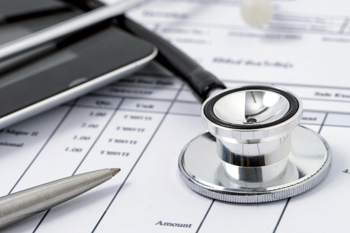 Why We Fight Medicare pillar: Stethoscope on top of paperwork