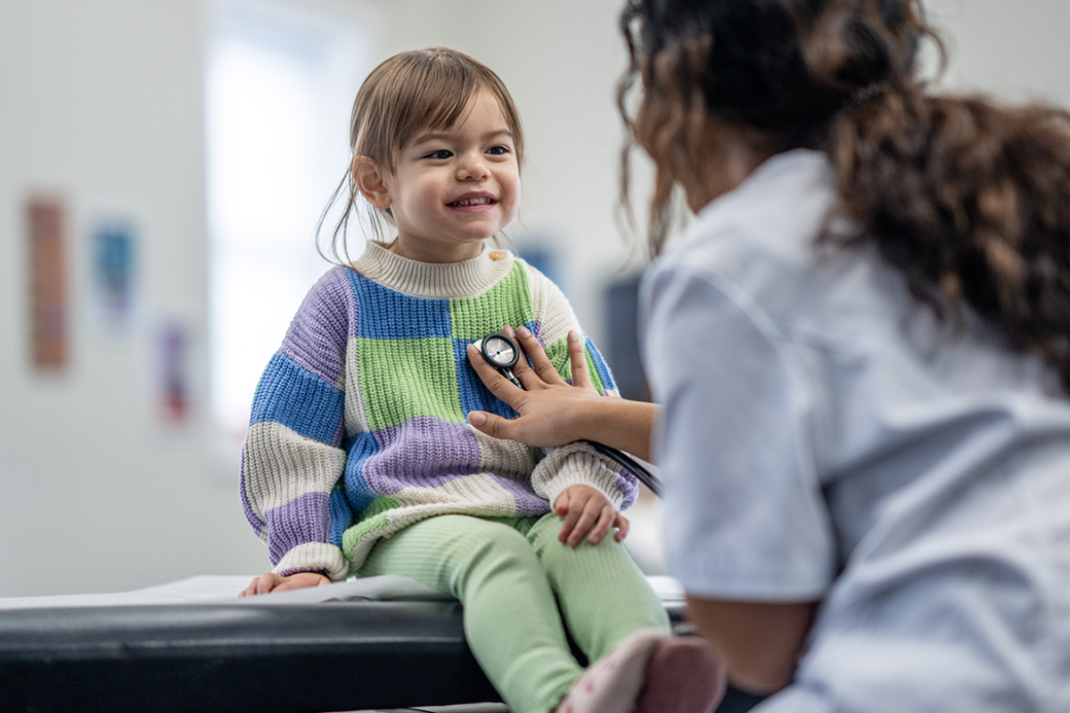 Smiling young child at a doctor's appointment